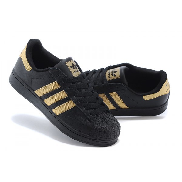 basket adidas noir et or